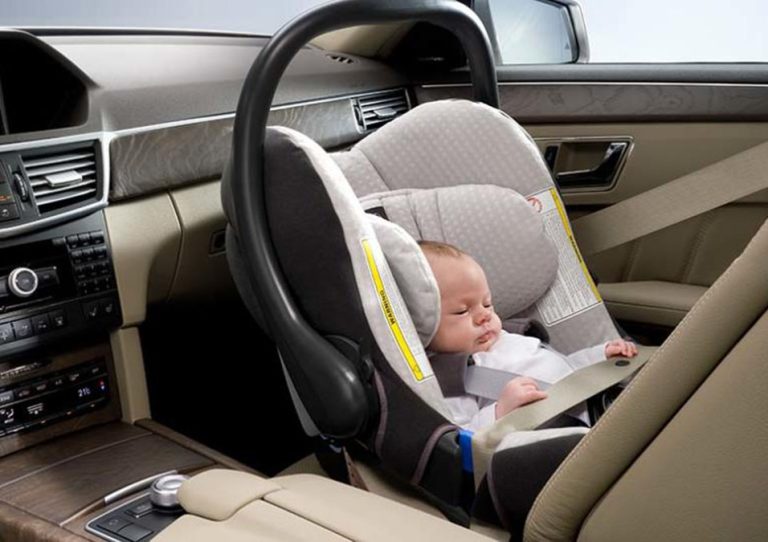 niño silla coche