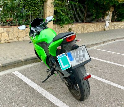 llevar L moto