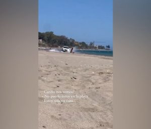 Conduce por mitad de la playa