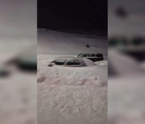 Coches enterrados en nieve